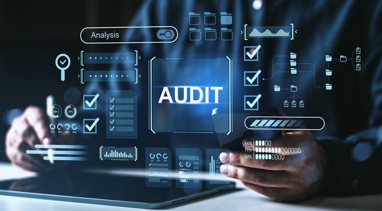 Businessperson using tablet with audit graphics